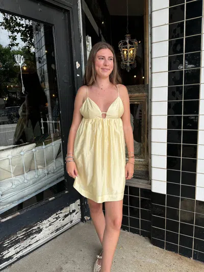 Crescent Babydoll Mini Dress In Butter Yellow