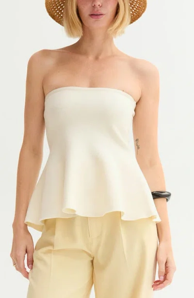 Crescent Jacquard Knit Peplum Top In Cream