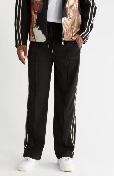 Criminal Damage Versus Track Pants In Black