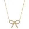 Crislu Fairy Tale Pavé Cubic Zirconia Bow Pendant Necklace In Gold