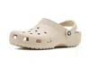 Crocs Solid Color Classic Clogs With Cut-out Details In Brown