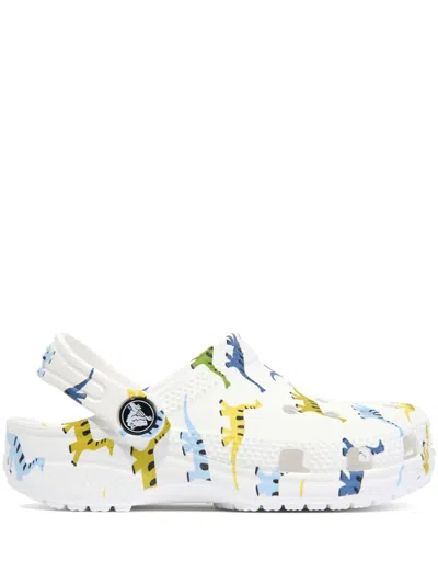 CROCS CLASSIC DINOSAUR-PRINT CLOGS