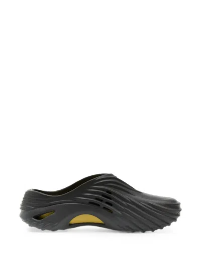 Crocs Echo Wave Mules In Black
