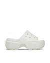 Crocs Logo Embossed Slippers In Chalk
