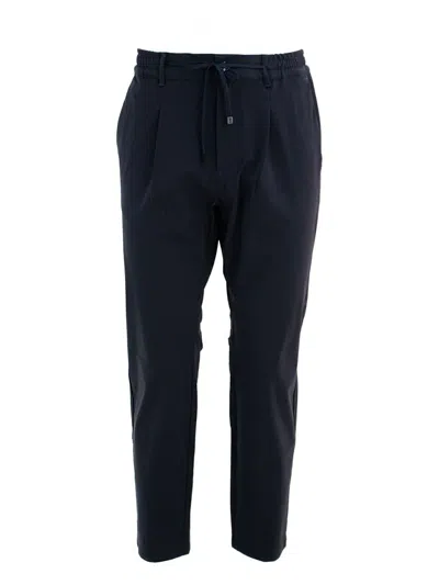 Cruna Pleated Cotton Trousers In Blue