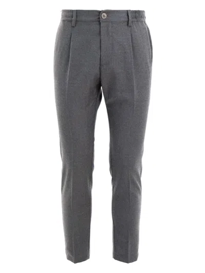 Cruna Pleated-front Trousers In Gray