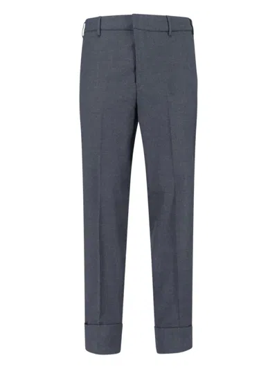 CRUNA PRESSED-CREASE TROUSERS