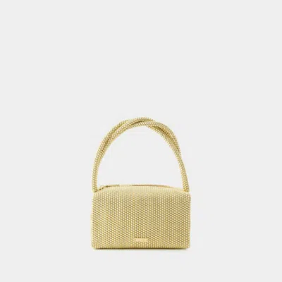 Cult Gaia Handbags In Gold