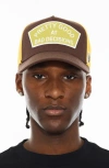 Cult Of Individuality Pretty Good At Bad Decisions Trucker Hat In Brown