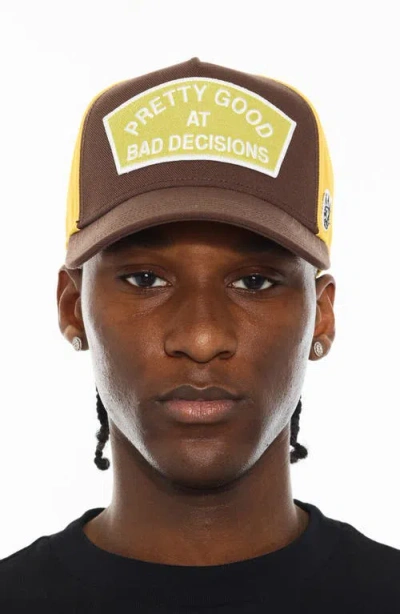 Cult Of Individuality Pretty Good At Bad Decisions Trucker Hat In Brown