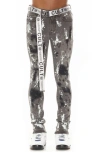 CULT OF INDIVIDUALITY PUNK BELTED RIP & REPAIR SUPER SKINNY JEANS