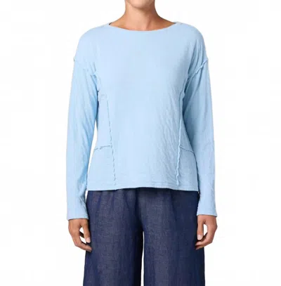 Cut Loose Long Sleeve Raw Edge Top In Bellflower In Blue