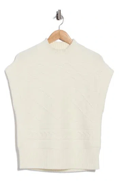 Cyrus Mock Neck Cable Knit Vest In Cream