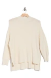 Cyrus Step Hem Waffle Stitch Sweater In Cream