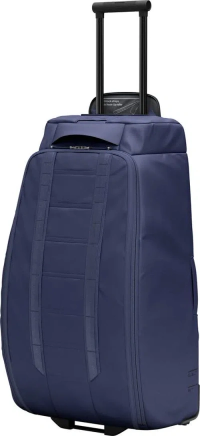 D_b_ Hugger Roller Bag Check In Wheeled Duffel 90l In Blue