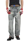 Dagger Distressed Patchwork Jeans In Blue