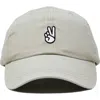 Dalix Peace Sign Embroidered Dad Hat In Washed Stone White