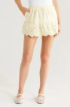 Damson Madder Gabriette Embroidered Eyelet Organic Cotton Miniskirt In Yellow