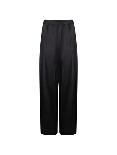 Danamè Pleated Satin-finish Trousers In Black