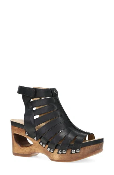 Dansko Adie Ankle Strap Platform Wedge Sandal In Black Calf