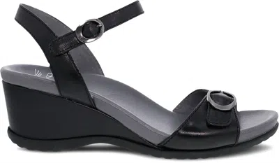 Dansko Women's Arielle Wedge Sandal In Black Glazed