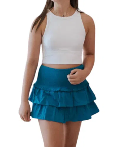 Day + Moon Smocked Waist Ruffle Skort In Blue