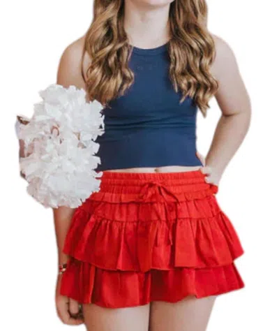 Day + Moon Smocked Waist Ruffle Skort In Red