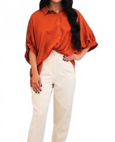 Day + Moon Solara Satin Button Down Top In Rust In Orange