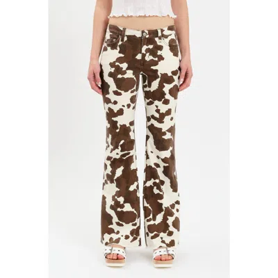 Daze Lowkey Cow Print Flare Jeans In Animal Print
