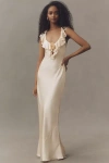 De La Vali Nema Ruffle Rosette Silk Satin Maxi Dress In White