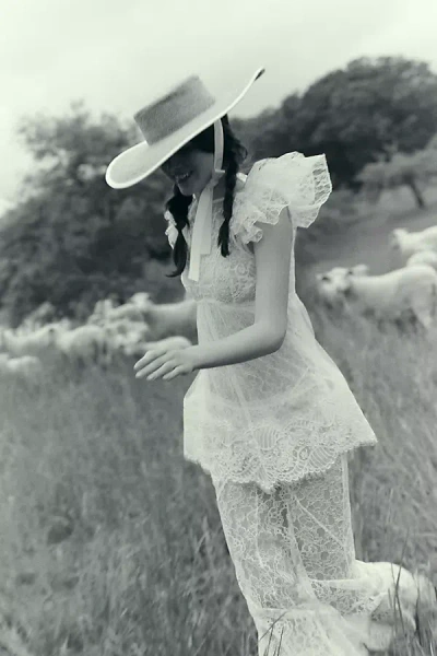 De La Vali Nephele Lace Flutter-sleeve Fishtail Maxi Dress In White