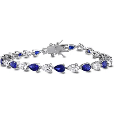Delmar Created Blue & White Sapphire Tennis Bracelet In Gold