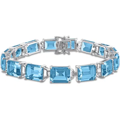 Delmar Emerald-cut Sky Blue Topaz Tennis Bracelet
