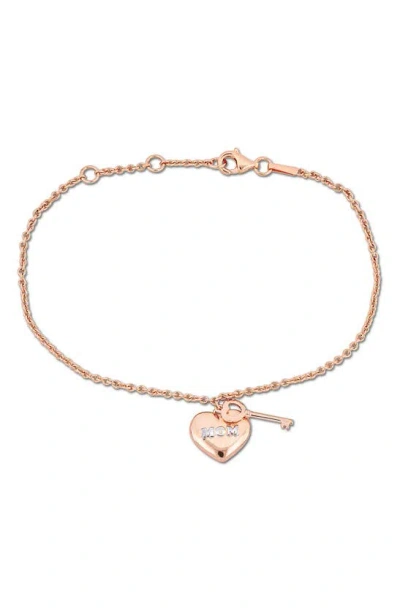 Delmar Heart & Key Charm Bracelet In Pink