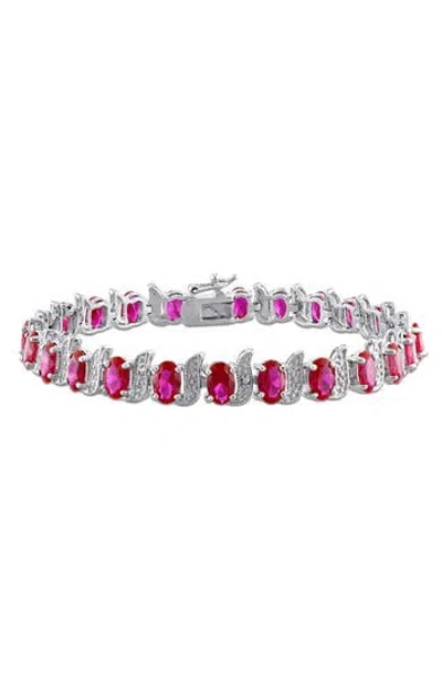 Delmar Oval Cut Created Ruby Tennis Bracelet In Pink