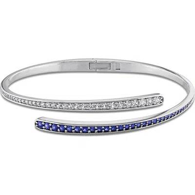 Delmar Sterling Silver Lab Created Sapphire Crossover Bangle Bracelet In Blue