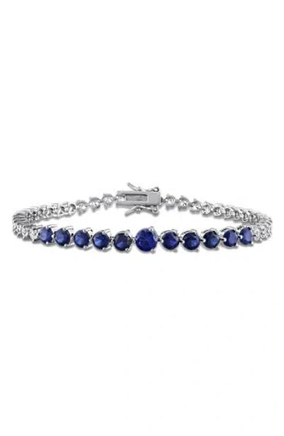 Delmar Sterling Silver Lab Grown Blue & White Sapphire Tennis Bracelet In Metallic