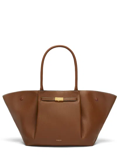 Demellier The Brooklyn Mini Grained Leather Handbag With Sculptural Silhouette In Brown