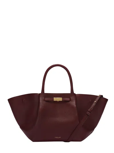 Demellier The New York Midi Handbag In Fine-grain Calfskin With Gold Hardware In Bordeaux