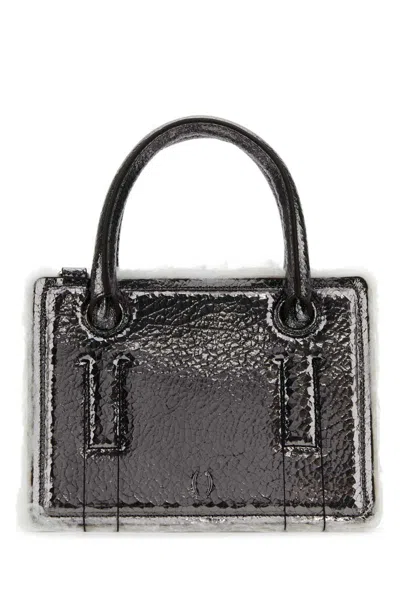 Dentro Handbags.