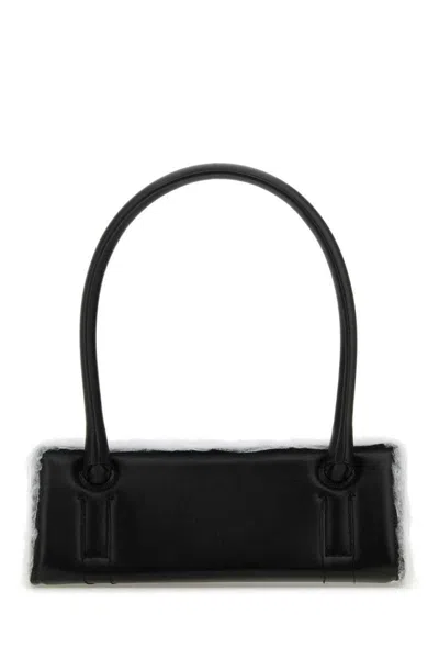 Dentro Handbags.