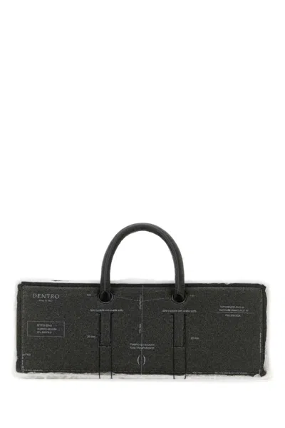 Dentro Handbags. In Black