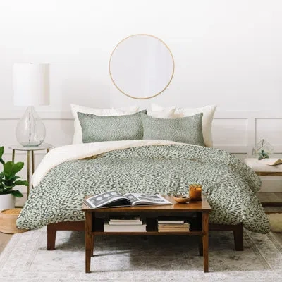 Deny Designs Holli Zollinger Deco Leopard Duvet Cover In The Background Is Mint Pastel Green And