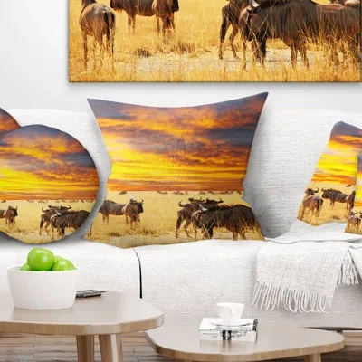 Design Art Antelope Crowd At Sunset - Animal Printed Pillow In Yellow
