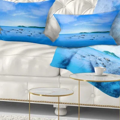 Design Art Baratti Bay Small Rocks In Blue Sea - Sea & Shore Printed Throw Pillow