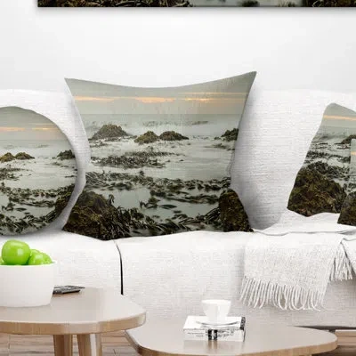 Design Art Gloomy Sunset Over Rocks And Waves - Sea & Shore Printed Pillow In Blue;orange