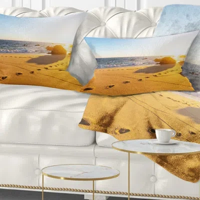 Design Art Large Footprints On Beach Sand - Sea & Shore Printed Throw Pillow In Multi-color
