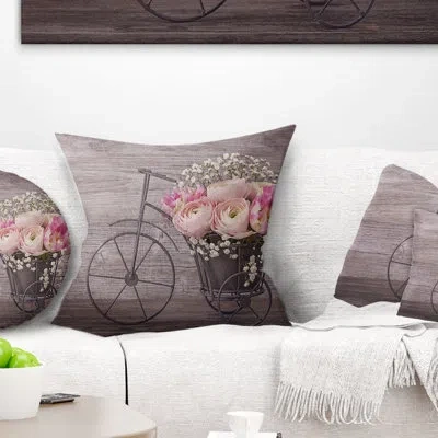 Design Art Ranunculus Flowers On Bicycle - Floral Printed Pillow In Brown