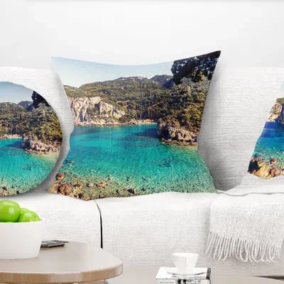 Design Art Rocky Beach With Turquoise Water - Sea & Shore Printed Throw Pillow In Green