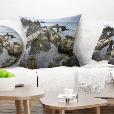 Design Art Rocky North Ireland Seashore - Sea & Shore Printed Pillow In Blue